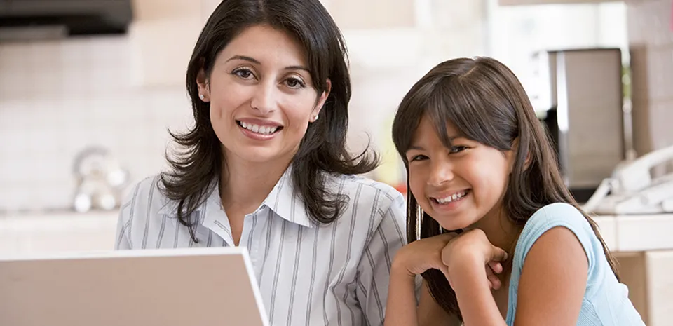 mom and child on laptop