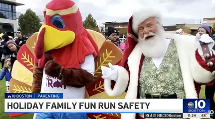 Holiday mascots participate in a holiday fun run.