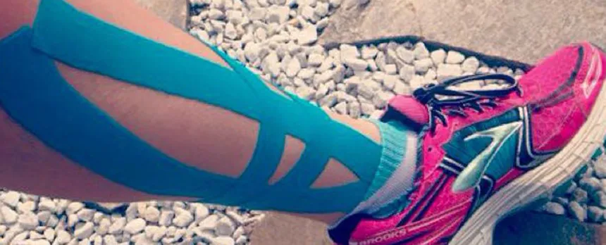 kinesiology tape on women's leg